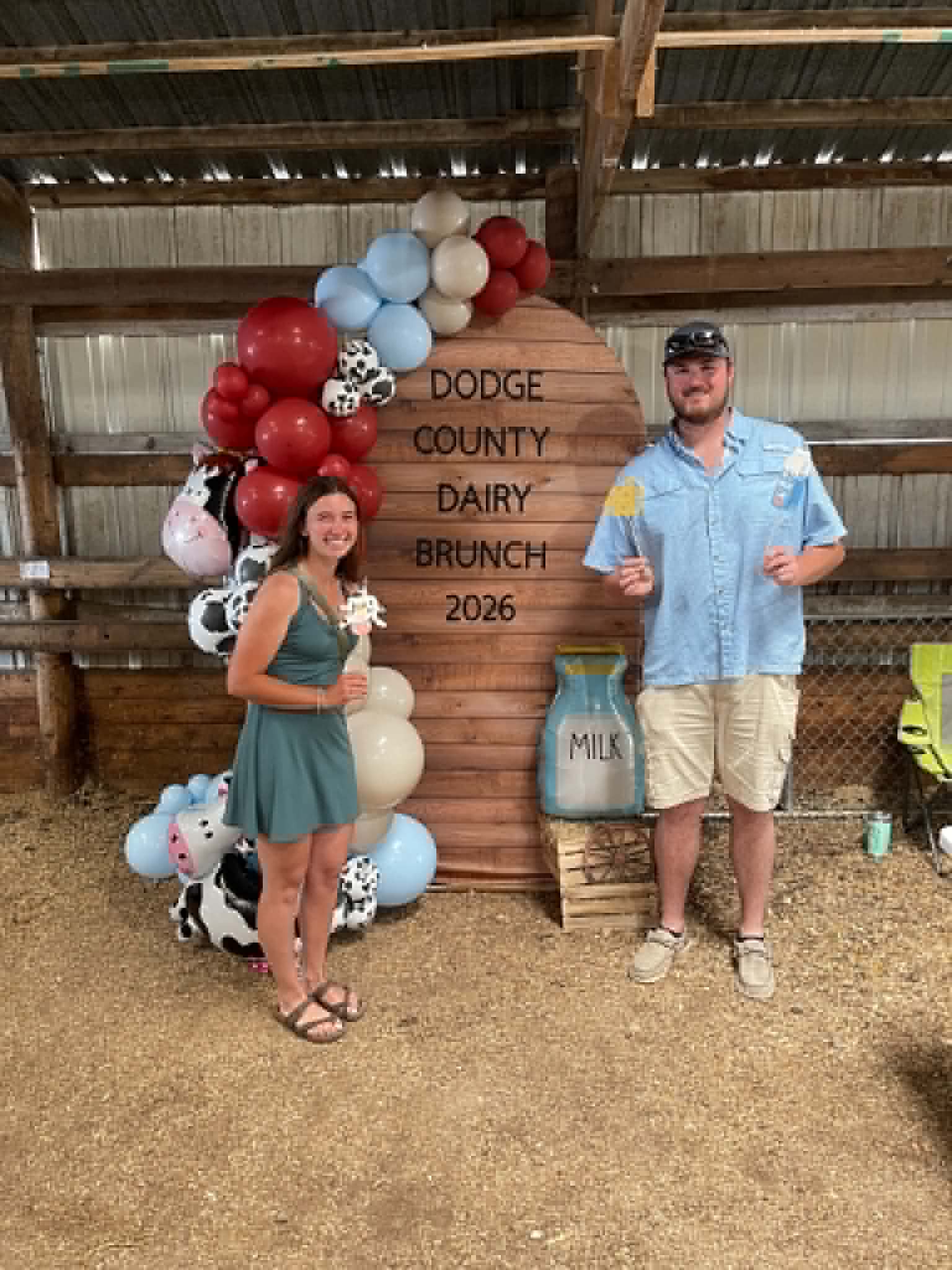 Corrales Designs Dodge County Dairy Brunch balloons and rustic backdrop