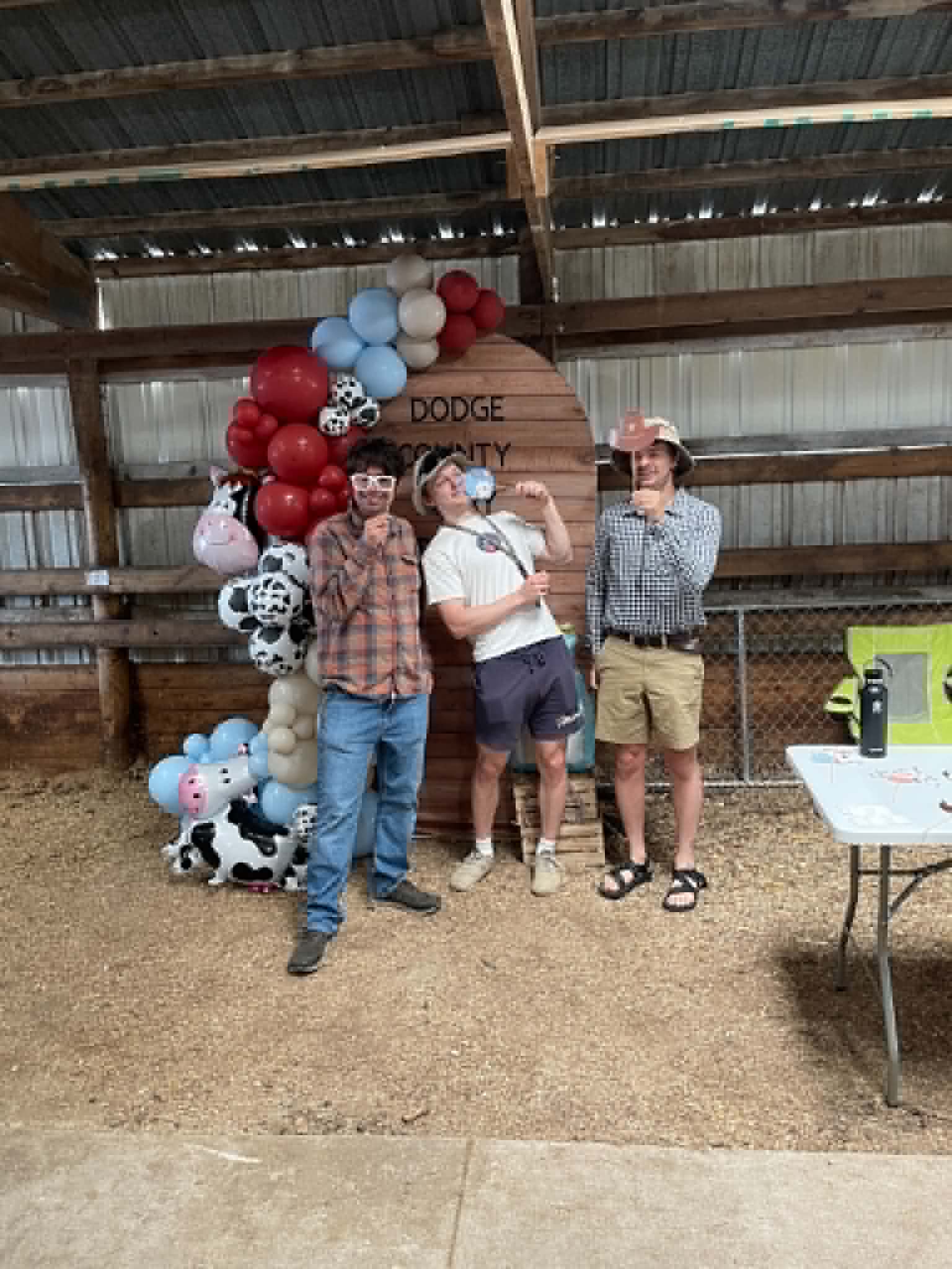 Group photo in front of the Corrales Designs Dodge County Dairy Brunch balloon arch