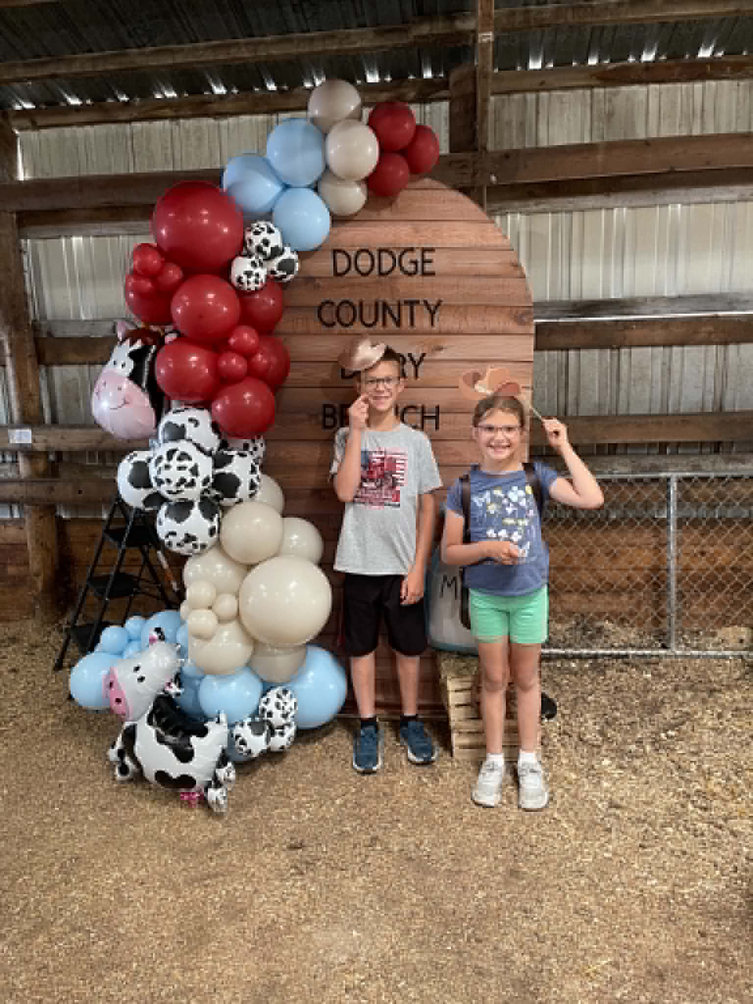 Guests enjoying the Corrales Designs Dodge County Dairy Brunch balloon photo area